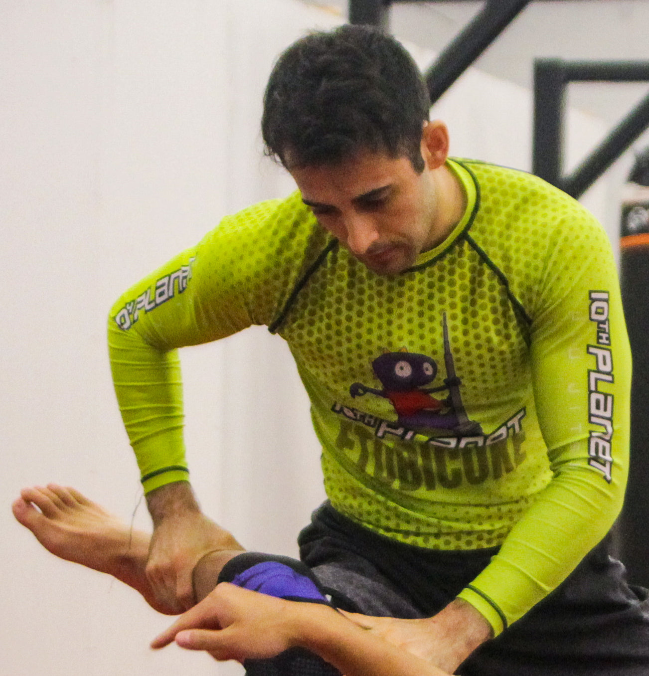 10th Planet Dino Rashguard Green